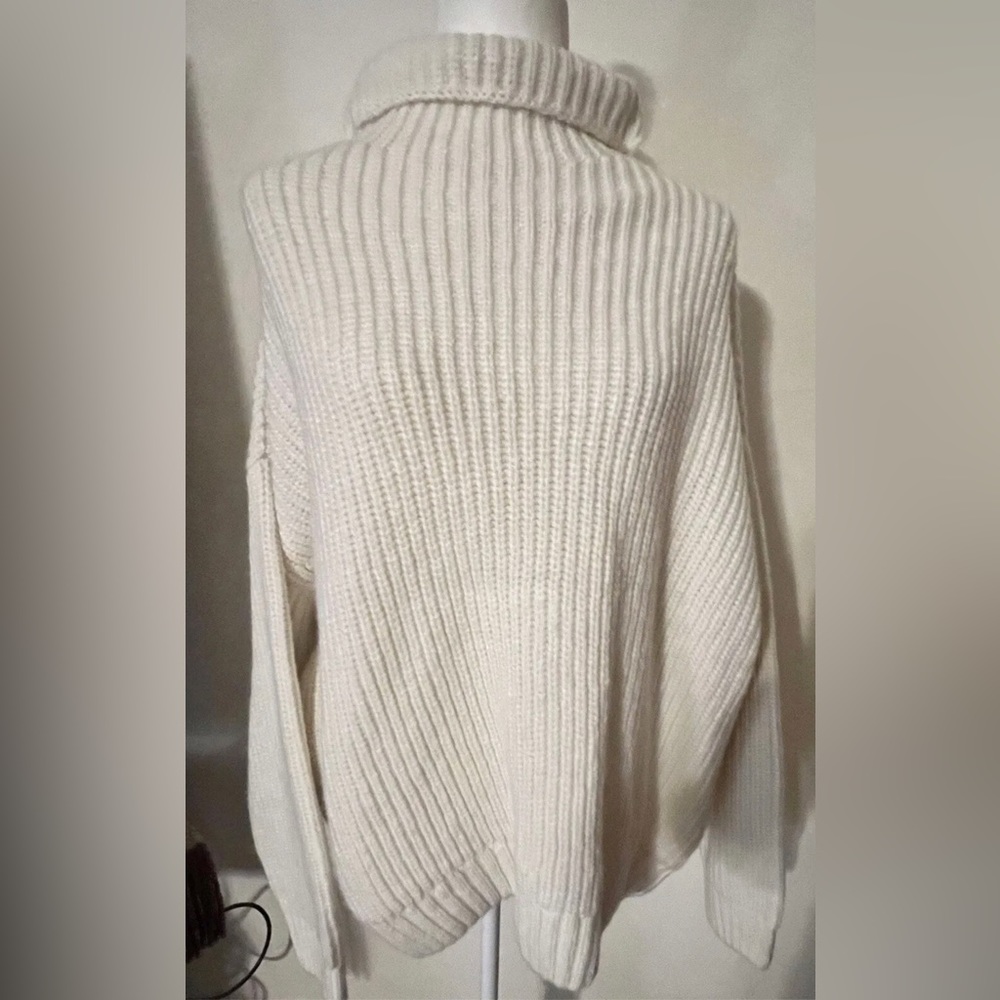 Anine Bing “Sidney” Turtleneck Sweater in Ivory ASO Meghan Markle
